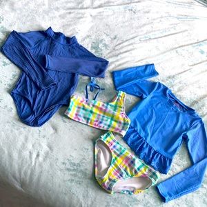 2 Girl’s bathing suits (size 7-8).
